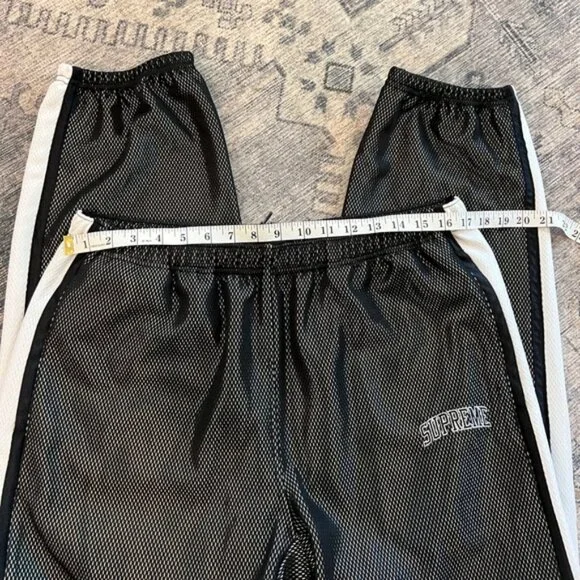 Supreme NYC men’s reflective bonded mesh track pants size large